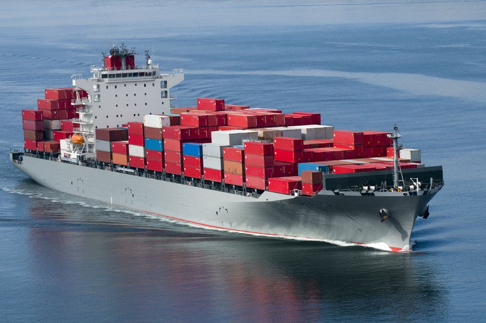 A container ship arriving in port on a very calm day. Please see my Ships lightbox: